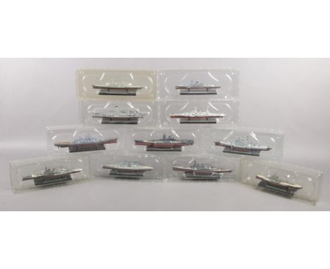 Eleven models of war ships on bases. Possibly Atlas Editions.  