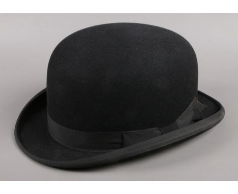 A vintage Moss Bros of Covent Garden bowler hat. Size 7 1/8.  