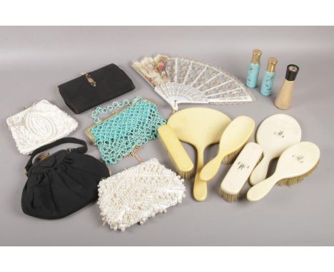 A quantity of miscellaneous. Vintage evening bags, dressing table set - mirror, brushes, Estee lauder youth dew empty bottles