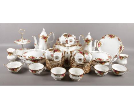 A large quantity of Royal Albert Old Country Roses dinner/teawares. Including teapots, cake stand, vase, cups &amp; saucers, 