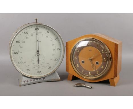 A large Junghans metal cased stop clock &amp; Smiths Enfield wooden mantle clock. Junghan model was manufactured in Germany c
