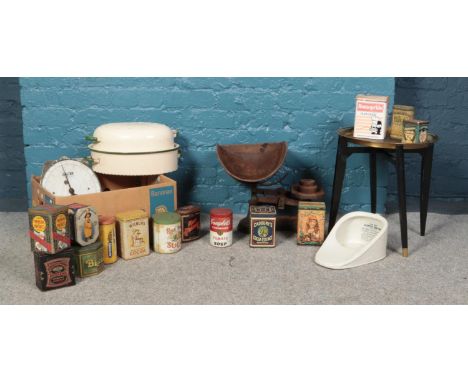 An assortment of metalwares. To include a vintage set of Potato scales and weights, an assortment of vintage tins, enamel fis