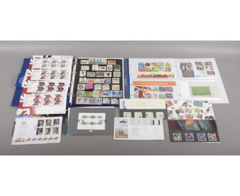 An album of mint stamps and 1st day covers. To include a set of four London 2012 Olympic Games gold medal winners, (Bradley W