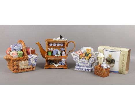 Three boxed limited edition Ringtons teapots and tea caddy. To include, ('Teatime -943), ('Monty' Basket -1721), (Millennium 