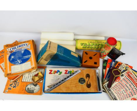 A mixed lot to include vintage toys, a boxed Zippy Zither, vintage Morphy Richards hairdryer, sheet music books, posters, a S