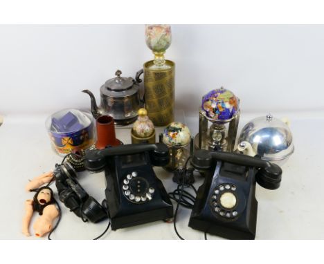 A pair of globe clocks, a pair of tea pots, A GAF view master of royal wedding, Strilling silver cat ornament, Hand Blown Stu