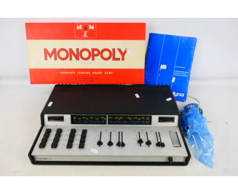 A Scan-Dyna 2400 receiver with instructions and a Waddingtons Monopoly game. [2]. [W]