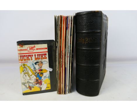 A quantity of 12" vinyl records to include Fleetwood Mac, Michael Jackson, Motown, Whitney Houston, Meat Loaf, Beethoven Viol