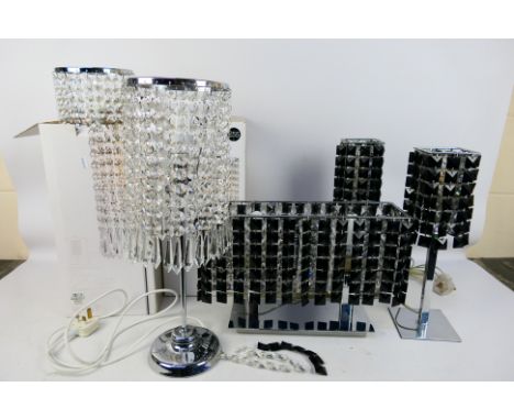 Home Lighting - A collection of table lamps, two pairs and one single, largest approximately 50 cm (h) and a bag of packaging