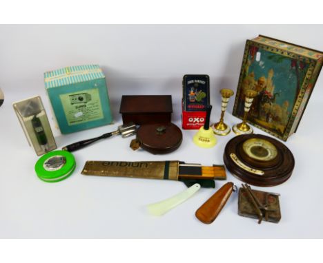 Mixed collectables to include vintage tins, barometer, tape measures, rotary hat iron and other. [W]