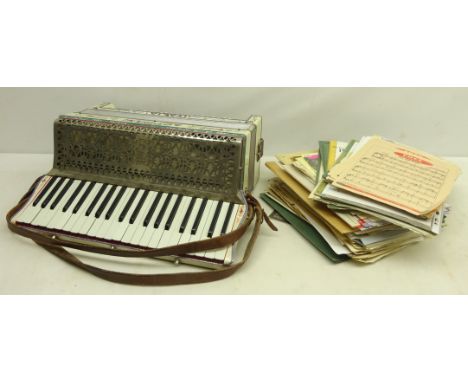 Italian Soprani piano accordion with a selection of vintage sheet music Condition Report Click here for further images, condi