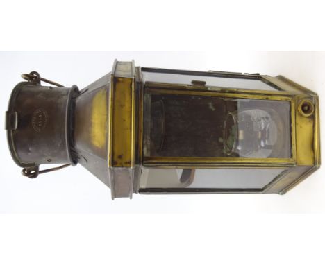 Bulpitt & Sons brass ships lamp, date 1915 with swing handle, H40cm  Condition Report Click here for further images, conditio