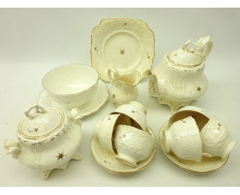 Early 19th century tea set, white ground with gilt highlights comprising teapot, six cups, four saucers, sucrier, slop bowl, 