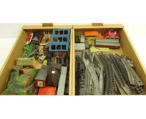 Quantity of vintage Tri-ang railway, model railway accessories, model cast metal signal posts, rolling stock etc, in two boxe