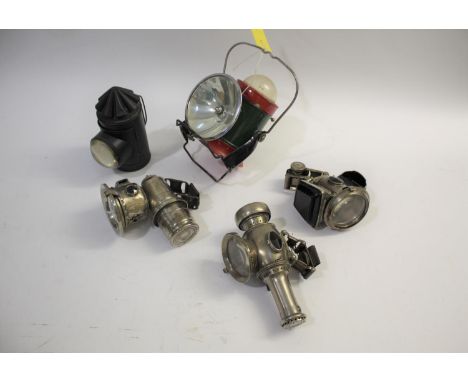 BICYCLE LAMPS including a Joseph Lucas Calcia Cadet, a Joseph Lucas Silver King, a Joseph Lucas Candle Lamp, a railway type l