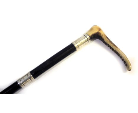 SWAINE &amp; ADENEY RIDING CROP with two silver mounted collars (London 1929) and with a button to the antler handle, marked 