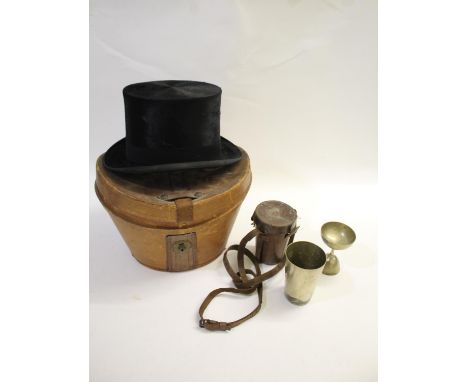 LEATHER CASED TOP HAT a leather case with velvet lined interior, with a black top hat by Tress &amp; Co, London, Made express