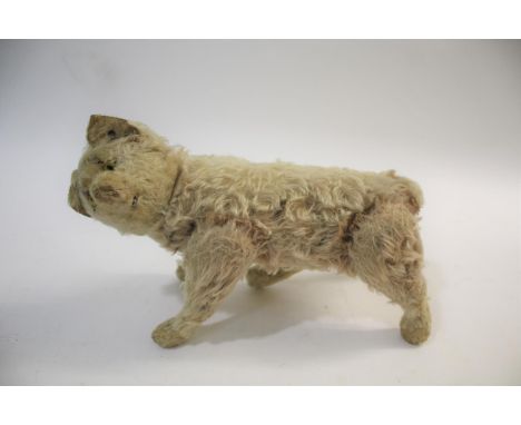 VINTAGE STEIFF CAT a soft toy cat with swivel limbs, glass eyes and stitched mouth. With a metal Steiff button in the ear. 35
