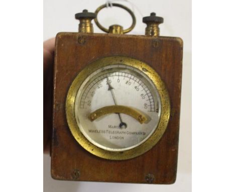 AN EARLY 20TH CENTURY MARCONI 'LINESMAN' METER. A Marconi galvanometer with silvered dial marked 'Marconi's Wireless Telegrap