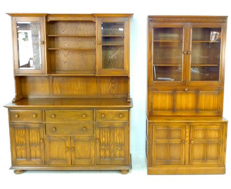 Two pieces of Ercol furniture, comprising a 'Canterbury' dresser in 'Golden dawn' finish 98 by 50 by 196.5cm high, and a 'Mur