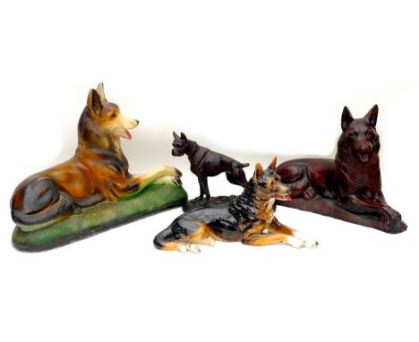 Four large canine figurines, comprising a bronzed metal Bulldog, 30 by 13.5 by 25cm hight, and hree German Shepherds, includi