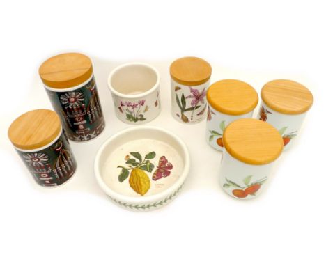 A group of vintage storage pots with wooden lids, comprising two Portmeirion 'Magic City' pattern, one Portmeirion 'The Botan