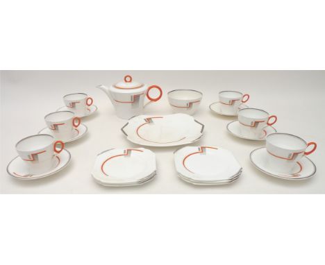 An Art Deco Shelley part tea service, decorated with an abstract design in orange and grey against a white ground, pattern nu