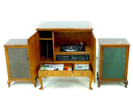 A Dynatron Radiogram walnut veneered music unit, with Garrard AP76 turntable Transcription Model, and SRX30C amplifier, 79 by