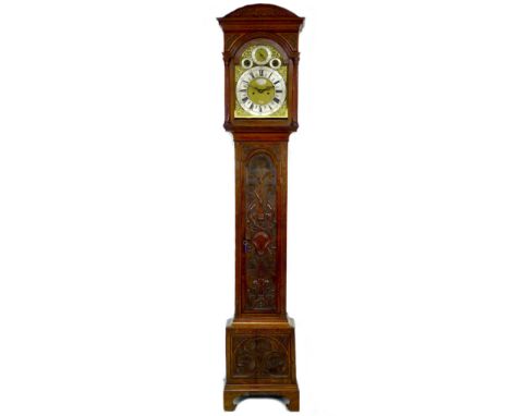 A George III tall oak long case clock, by John Tyler, Strand, London, 11½" engraved brass dial, silvered chapter ring, applie