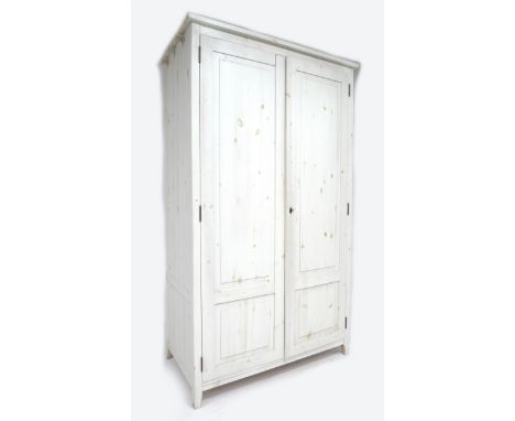 A modern pine white painted twin door wardrobe, 140 by 60 by 195cm high. 