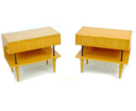 A pair of vintage 1950's tables, of modernist design, with glossy blonde veneer throughout, the tops with single drawers belo