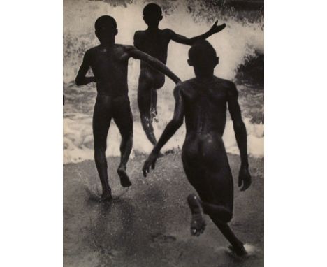 Artist: Martin Munkacsi (Hungarian, 1896-1963). Title: "Three Naked Boys at Lake Tanganyika". Medium: Original vintage photog