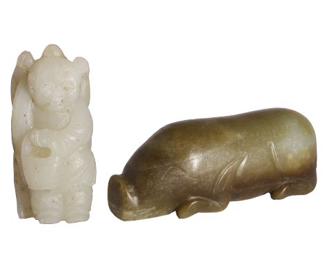 A CHINESE ARCHAISTIC JADE PIG carved as a recumbent animal, the stone of olive-green tone, 12.5cm long; together with a Chine