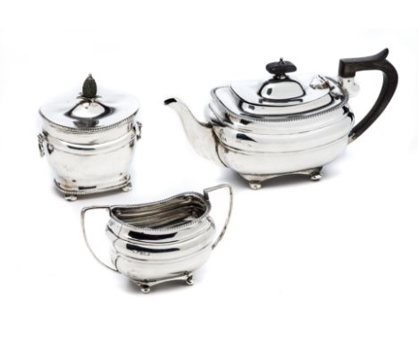 A GEORGE V SILVER TEAPOT AND SUGAR BOWL, PROBABLY FORDHAM &amp; FORDHAM, SHEFFIELD, 1916 oblong, with moulded sides, gadroon 