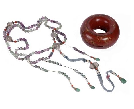 ˜A CHINESE FLUORSPAR, ROCK CRYSTAL AND CORAL COURT NECKLACE, QING DYNASTY, 19TH CENTURY comprised of one hundred and thirty-e