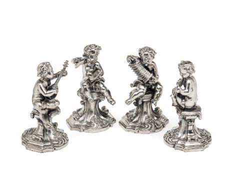 A SET OF FOUR ITALIAN FIGURES OF PUTTI, RICCI &amp; C., ALESSANDRIA, CIRCA 1960 each cast in Baroque style as a cherub musici