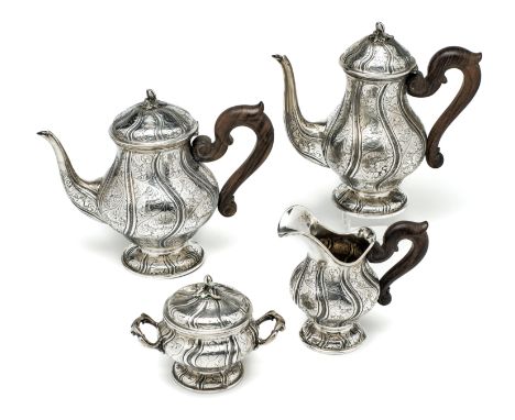 AN ITALIAN SILVER FOUR-PIECE TEA AND COFFEE SET, BENVENUTO REALI, MILAN, 1930s baluster, flat-chased with scroll leafage on a