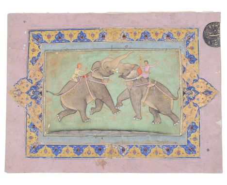 AN ELEPHANT FIGHT, MUGHAL, NORTHERN INDIA, 18TH CENTURY gouache with gold on paper, laid on card with unrelated manuscript il