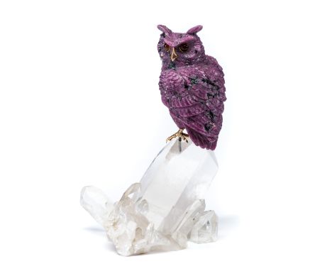 A RUBY FIGURE OF AN OWL, LUIS ALBERTO QUISPE APARICIO, LIMA, PERU, CIRCA 2000 realistically carved as a Great Horned Owl, the