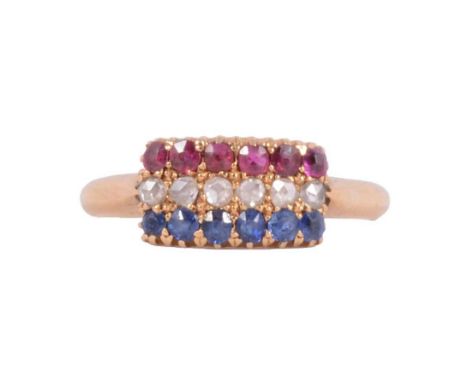 A ruby, sapphire and diamond three stone ring, six rubies, six sapphires and six rose cut diamonds claw set horizontally in a