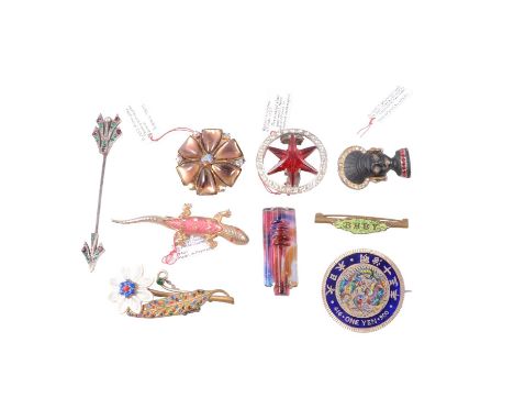 Sixteen novelty vintage pins and brooches, an enamelled coin brooch; paste garland brooch with red paste star to centre; plas