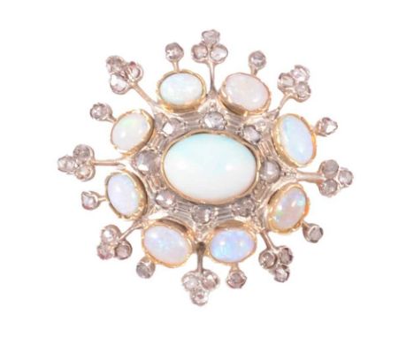 An old cut diamond and simulated opal brooch, the central simulated cabochon cut opal collet set surrounded by 8 old cut diam