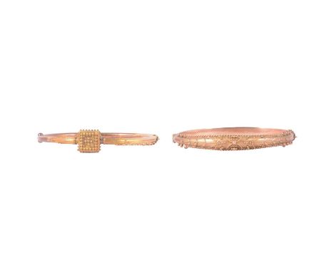 Two 9 carat yellow gold / yellow metal Etruscan style half hinged bangles, a 4.2mm gauge 9 carat yellow gold Etruscan style h