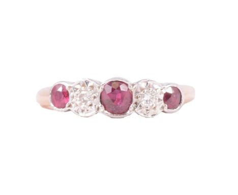 A ruby and diamond half hoop ring, the three circular rubies collet set with two illusion set brilliant cut diamonds between,