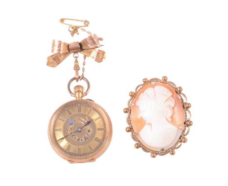 A yellow metal open face fob watch, gold bow brooch, and carved shell cameo brooch, a yellow metal open face fob watch, gold-