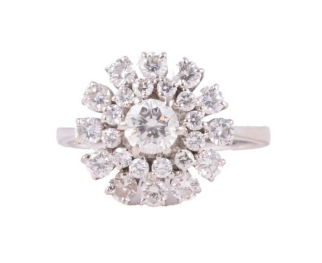 A diamond cluster ring, the central brilliant cut stone, 5.3x3.4mm, surrounded by two borders of twelve smaller brilliant cut