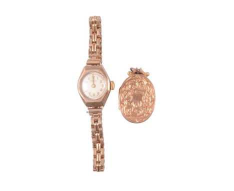 A 15 carat yellow gold locket, and 9 carat yellow gold wristwatch, a 15 carat yellow gold locket, scroll and floral design to