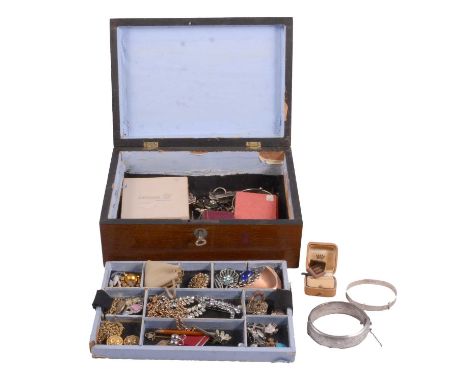 A parquetry inlaid mahogany jewel box and costume jewellery, a silver Victorian style half hinged bangle; child's expanding b