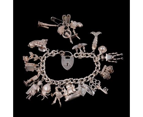 A silver charm bracelet, and some loose charms, a silver charm bracelet, 6.9mm gauge curb links, fitted with a padlock fasten
