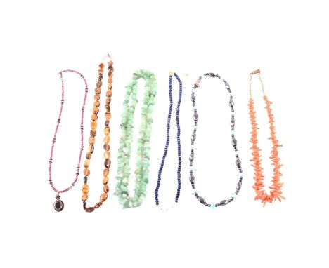 A collection of gemstone bead necklaces, to include garnet, opal, amethyst, amber, fluorite, tiger's eye, hematite, coral, wi